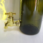 Bottiglia olio con rubinetto.